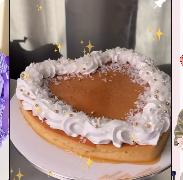 Heart-shaped tres leches cake with whipped cream